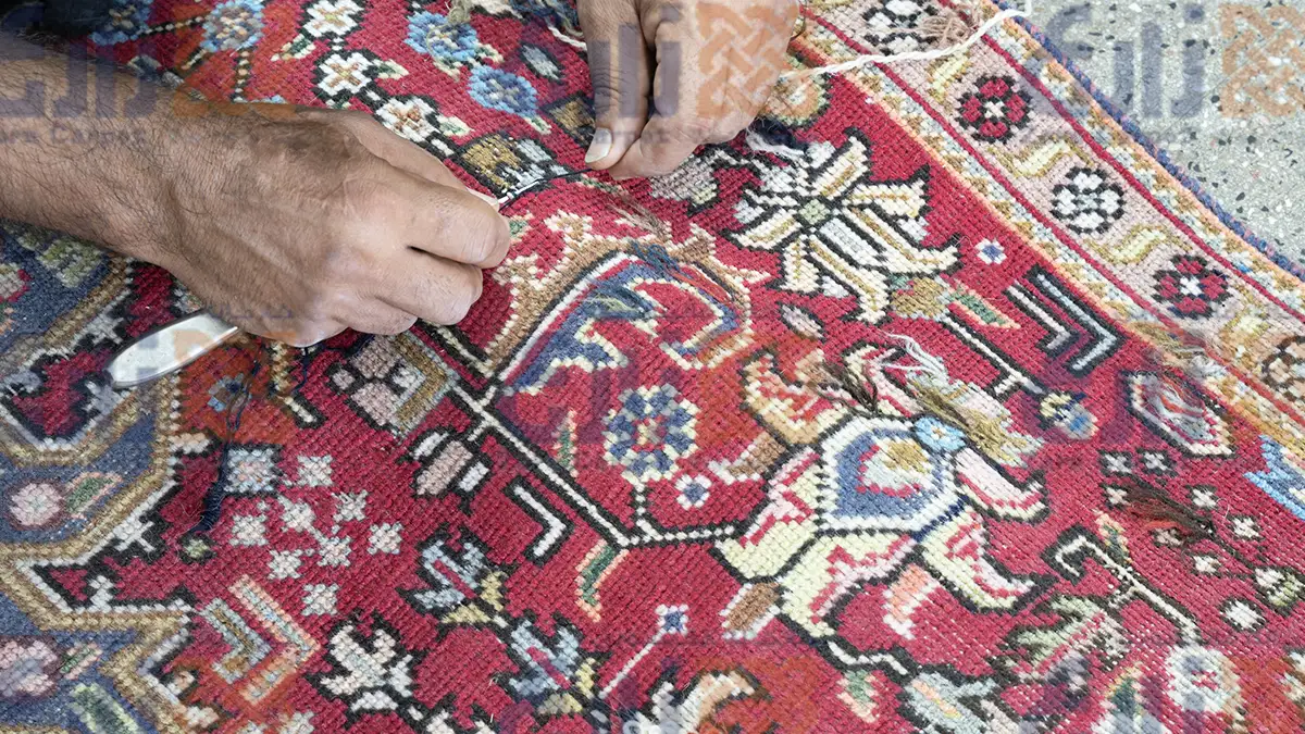 رفع تخصصی بیدخوردگی فرش دستباف در کارخانه قالیشویی زارع